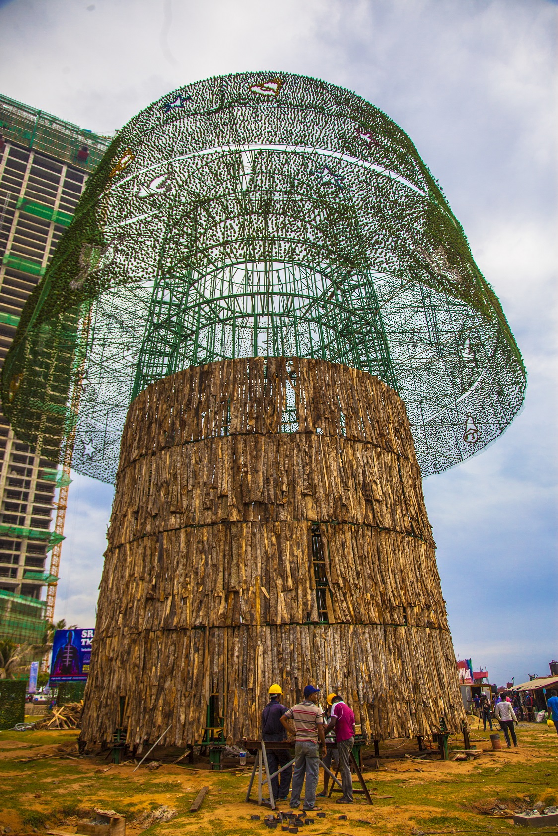 The tree, made from scrap materials, will stand at nearly 100 metres [Angelo Samarawickrema /Al Jazeera]