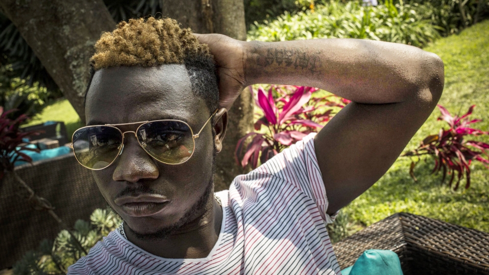  Olivier Bayongwa is a rapper, who goes by the name of 'Fantastiko'. He believes that body art is a reflection of his music [Francesca Volpi/Al Jazeera]