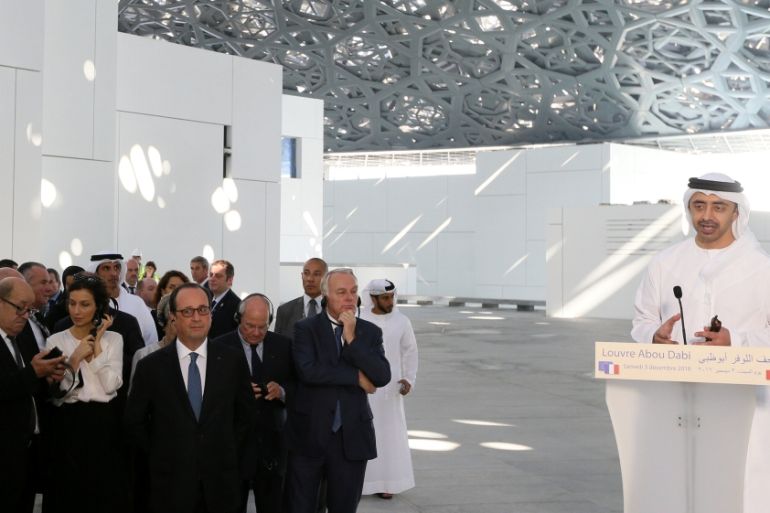 Emirati Foreign Minister Sheikh Abdullah bin Zayed al-Nahyan speaks during a visit by French President Francois Hollande to Louvre Abu Dhabi