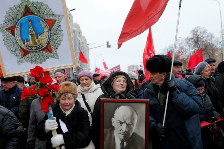 Russian communist supporters attend a rally marking the anniversary of the 1917 Bolshevik revolution in Moscow
