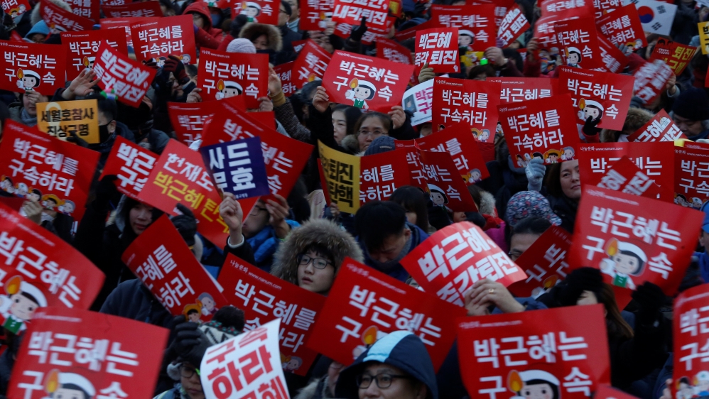 Thousands have demanded the resignation of President  Park Geun-hye over the scandal [Kim Hong-ji/Reuters]