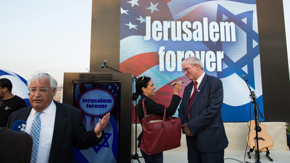 Trump's Israel adviser David Friedman, left, is a staunch supporter of Israeli settlements in occupied Palestinian territory [File: Abir Sultan/EPA]