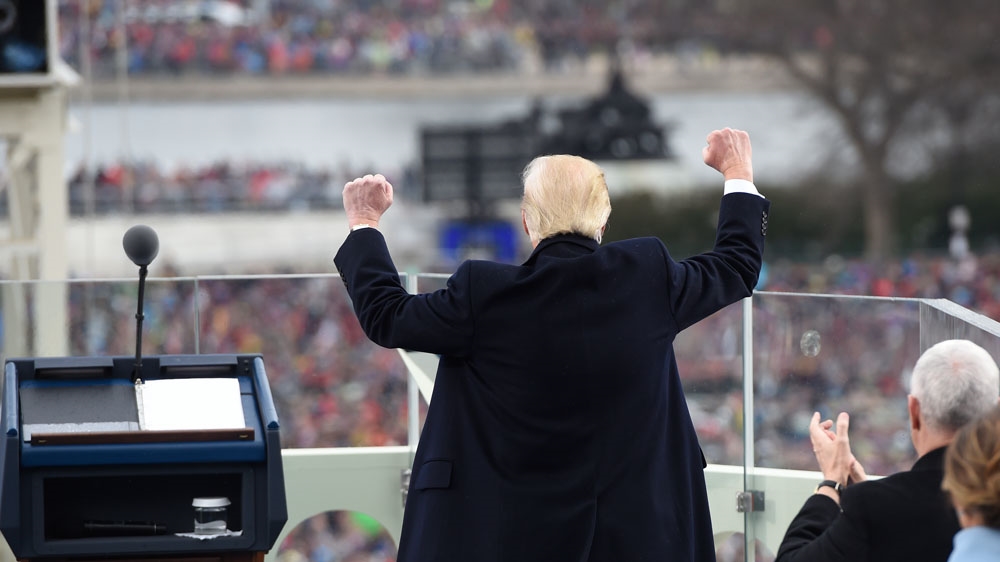 Donald Trump at podium during inauguration ceremony outside Capitol in Washington, DC [Reuters]