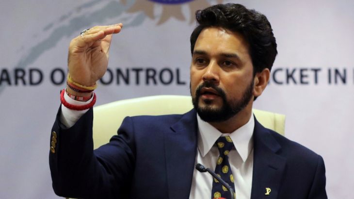 FILE PHOTO: Thakur gestures during a news conference in Mumbai