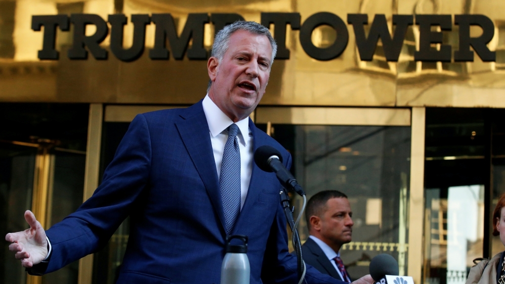 New York City Mayor Bill de Blasio rejected Trump's controversial immigration policies and said he will refuse to let the president-elect 'tear families apart' [Brendan McDermid/Reuters]