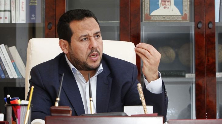 Abdul Hakeem Belhadj, leader of the Al-Watan party, speaks during an interview with Reuters in Tripoli