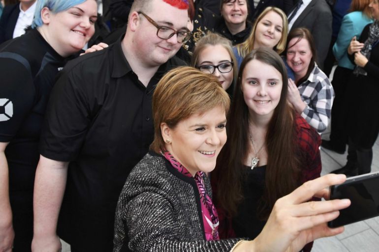 First Minister of Scotland Nicola Sturgeon takes a selfie with students as she officially opens the revamped Kilmarnock campus of Ayrshire College in Kilmarnock
