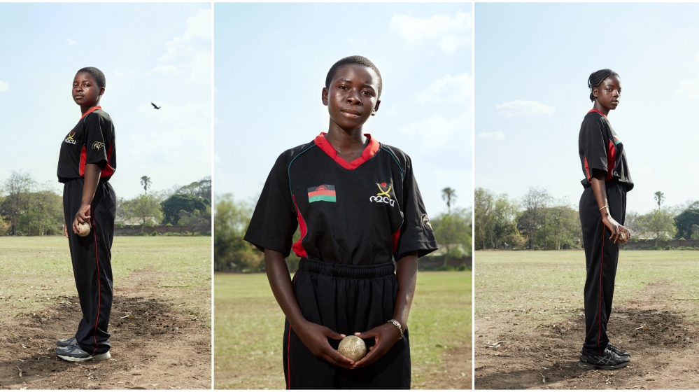 From left: bowler Brenda Ndipo,15, bowler Triphonia Luka, 15 and bowler Chimwemwe Juma, 16, on the pitch at St Andrew's International School, Blantyre, Malawi, 2016 [Julia Gunther/Al Jazeera]