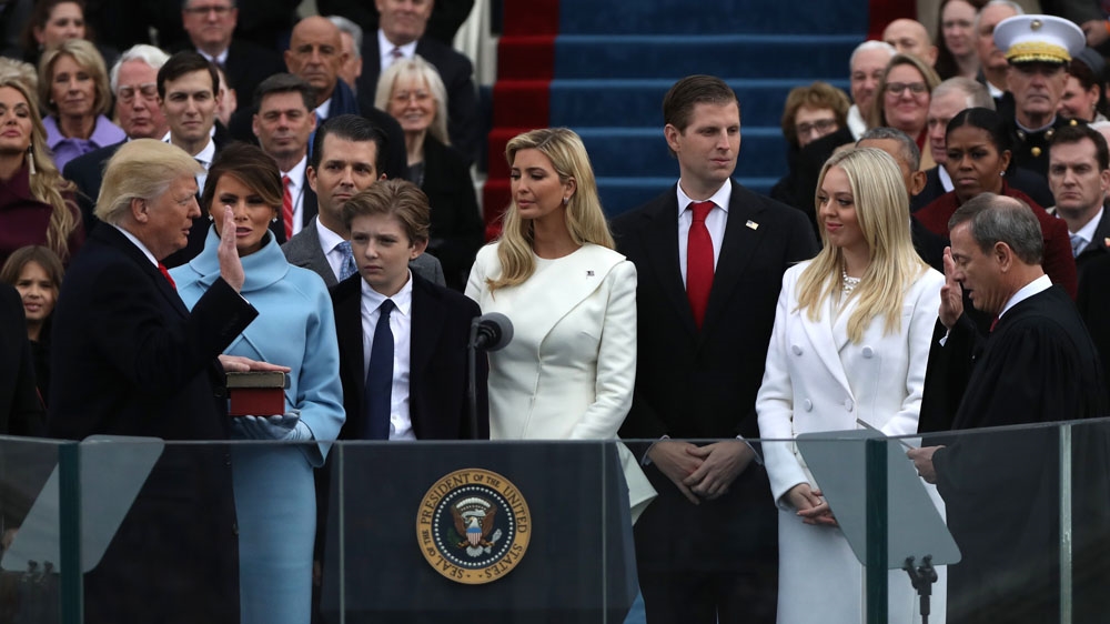 US President Donald Trump takes the oath of office from US Supreme Court Chief Justice John Roberts [Reuters]