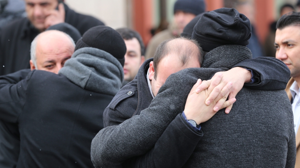 Relatives of victims gathered in front of the forensic medicine institute after the attack [EPA]