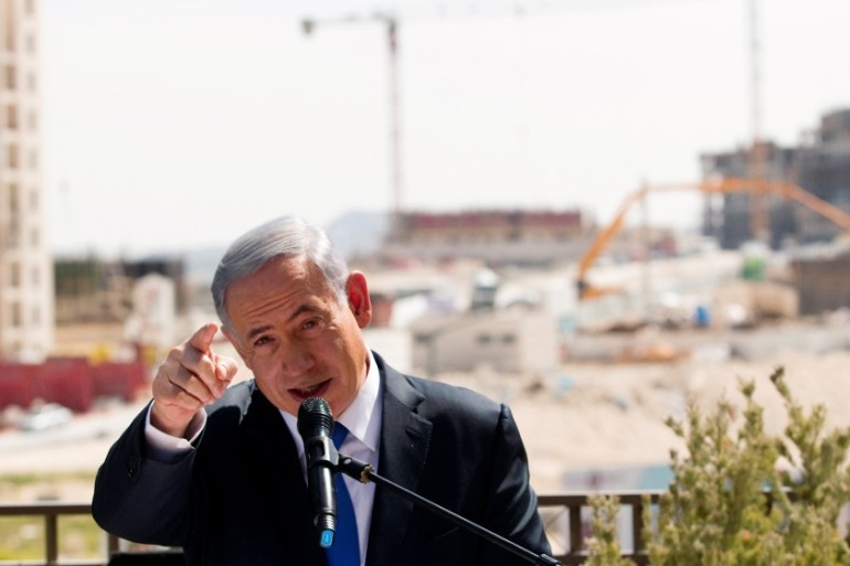 FILE PHOTO: Israeli Prime Minister Benjamin Netanyahu delivers a statement in front of new construction, in the Jewish settlement known to Israelis as Har Homa and to Palestinians as Jabal Abu Ghneim