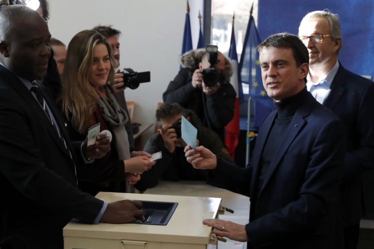 Former French Prime Minister and candidate Manuel Valls votes in the first round of the French left''s presidential primary election in Evry