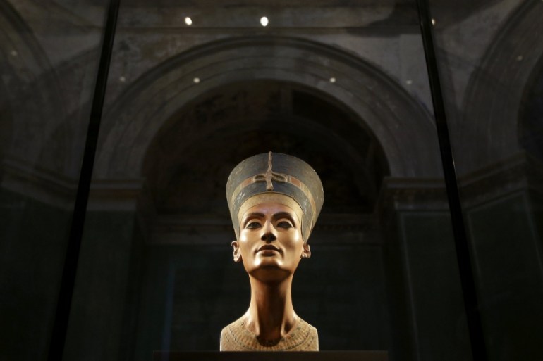 The Nefertiti bust is pictured during a press preview of the exhibition ''In The Light Of Amarna'' at the Neues Museum in Berlin