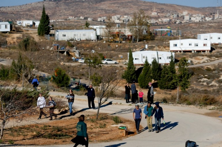 FILE PHOTO: Israelis prepare for an expected eviction of the Jewish settlement outpost of Amona in the occupied West Bank