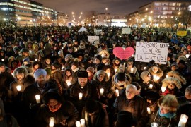People attend a vigil in support of the Muslim community in Montreal