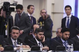 Head of Syrian opposition delegation Alloush attends Syria peace talks in Astana