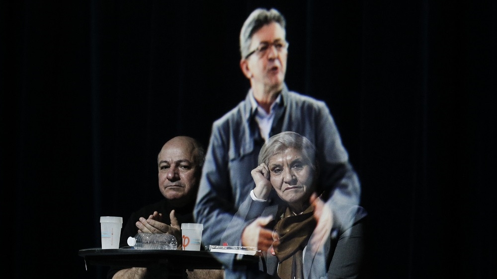 Melenchon appeared in Paris in the form of a two-dimensional hologram [The Associated Press]