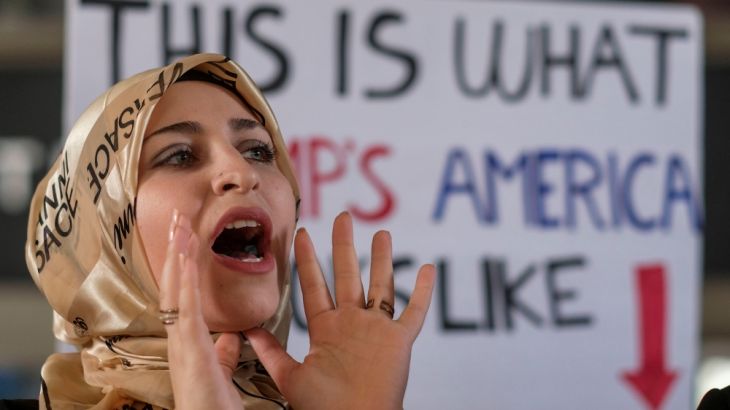 Muslim woman demonstrates against President Donald Trump''s Muslim ban