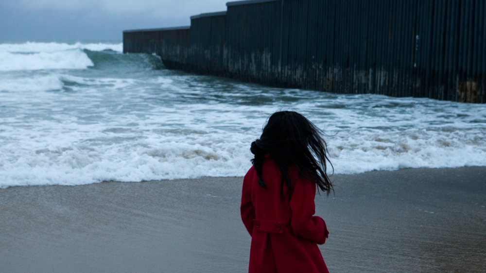 The US-Mexico wall as seen from Playas de Tijuana in Mexico   [   Jessica Chou/Al Jazeera] 