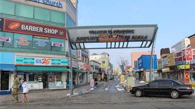 Many of the signs in Pyeongtaek's commercial area are in English and American fast-food restaurants line the streets [Steven Borowiec/Al Jazeera]