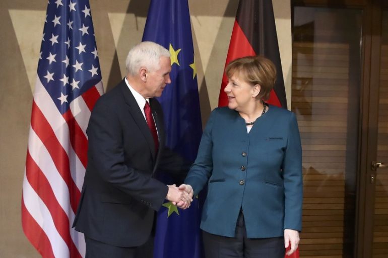 German Chancellor Merkel poses for a picture with U.S. Vice President Pence before their meeting at the 53rd Munich Security Conference in Munich