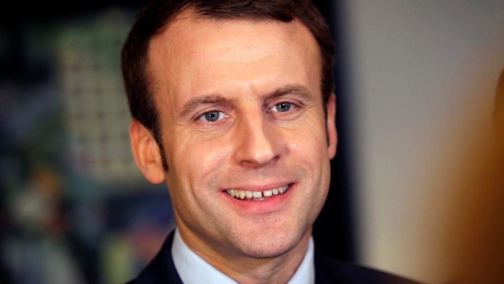 Emmanuel Macron is a pro-EU centrist who has promised cuts to public spending [Ramzi Boudina/Reuters]