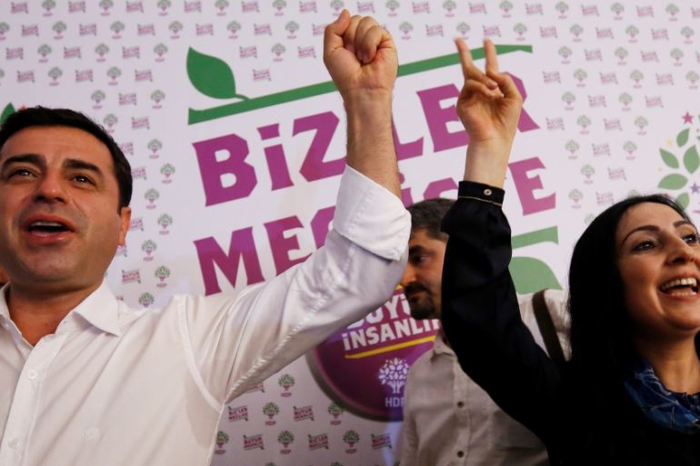 File photo of co-chairs of the pro-Kurdish HDP, Demirtas and Yuksekdag, celebrating election results during a news conference in Istanbul