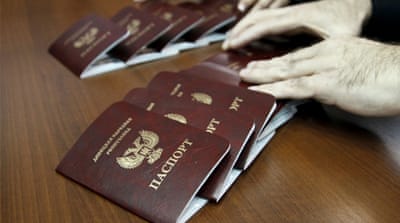 Passports of the self-proclaimed Donetsk People's Republic [File: Reuters]