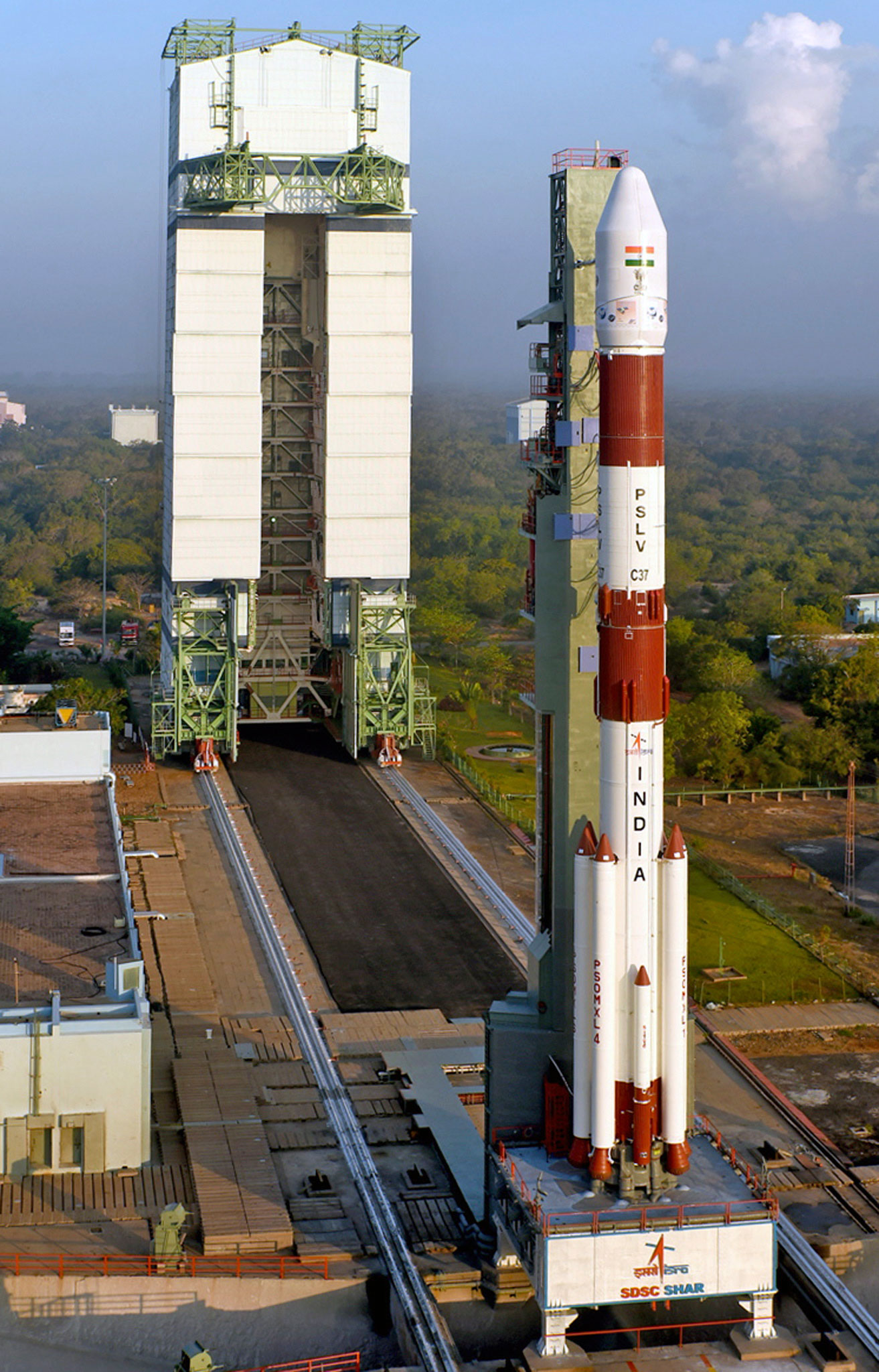 





Indian Space Research Organisation (ISRO) built the PSLV-C37 seen here with a Mobile Service Tower at the Satish Dhawan Space Centre in Sriharikota [EPA]





Indian Space Research Organisation (ISRO) built the PSLV-C37 seen here with a Mobile Service Tower at the Satish Dhawan Space Centre in Sriharikota [EPA]
