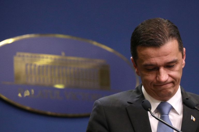 Romania''s Prime Minister Grindeanu reacts after delivering a speech in Bucharest