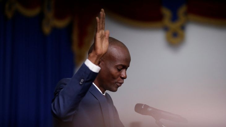Haitian President Jovenel Moise takes the oath of office during his inauguration in Port-au-Prince