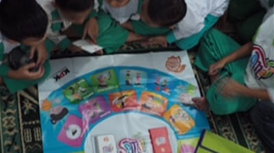 Children playing Semai [Jeffrey Hutton/Al Jazeera]