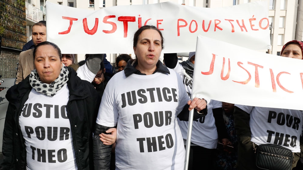 Women hold a 'Justice for Theo' banner during a protest in Paris [EPA]
