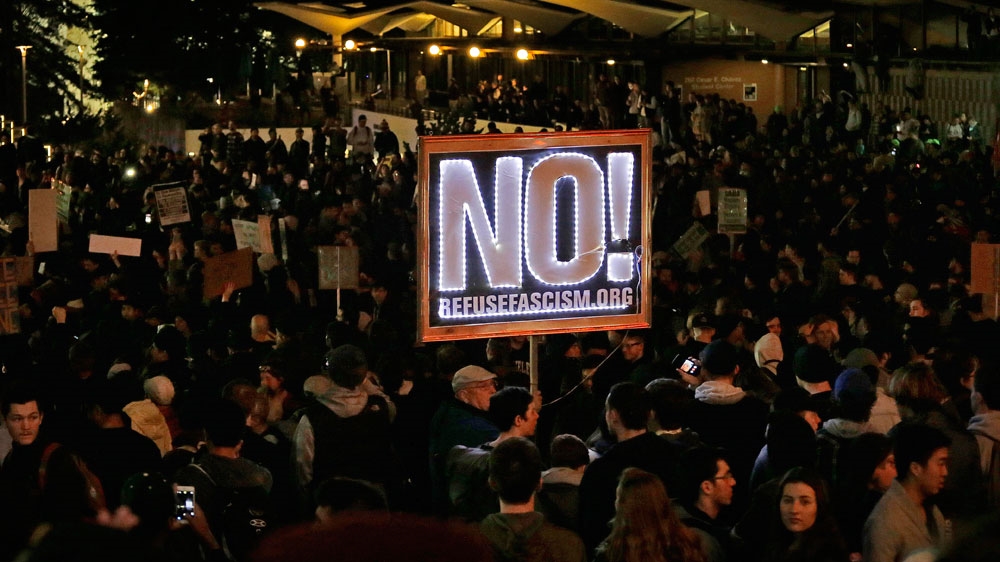 Protesters against a scheduled speaking appearance by polarising Breitbart News editor Milo Yiannopoulos fill Sproul Plaza on the University of California at Berkeley campus [Ben Margot/AP]