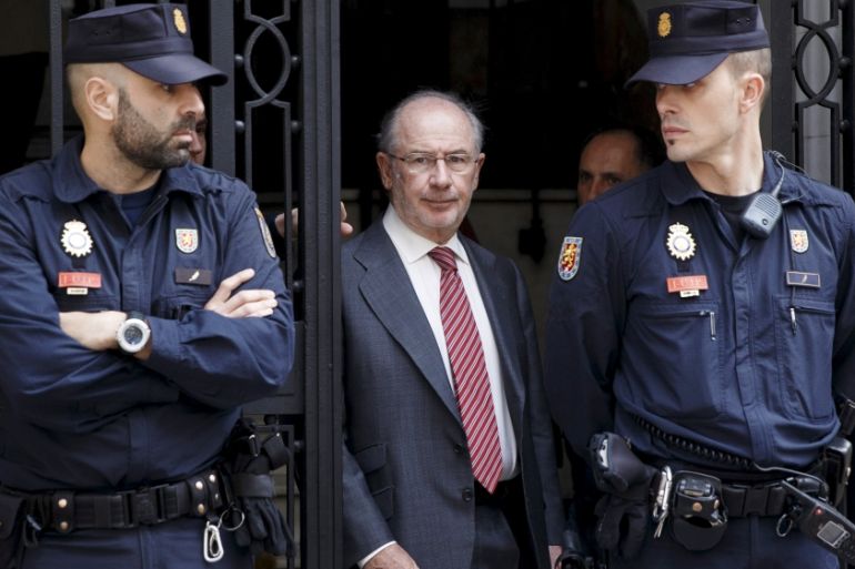FILE PHOTO Former IMF chief Rodrigo Rato leaves his Madrid office following a search by tax inspectors