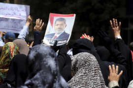Supporters of deposed Egyptian President Mursi shout slogans against an Egyptian court''s decision to sentence Mursi and other leaders to death, at a rally in Al Haram street near Giza square