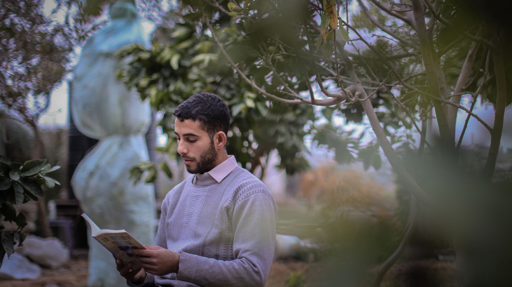 'Language is what makes us all human,' Abu Toha says [Ezz Zanoun/Al Jazeera]