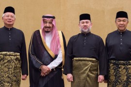 Saudi Arabia''s King Salman poses for a photo with Malaysian King Muhammad V and Malaysian Prime Minister Najib Razak in Kuala Lumpur