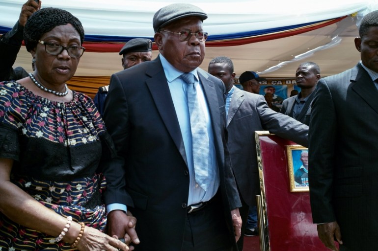 Congolese opposition leader Tshisekedi and his wife Marthe arrive to pay their last respects before a funeral service at the UDPS headquarters in Limete, Kinshasa