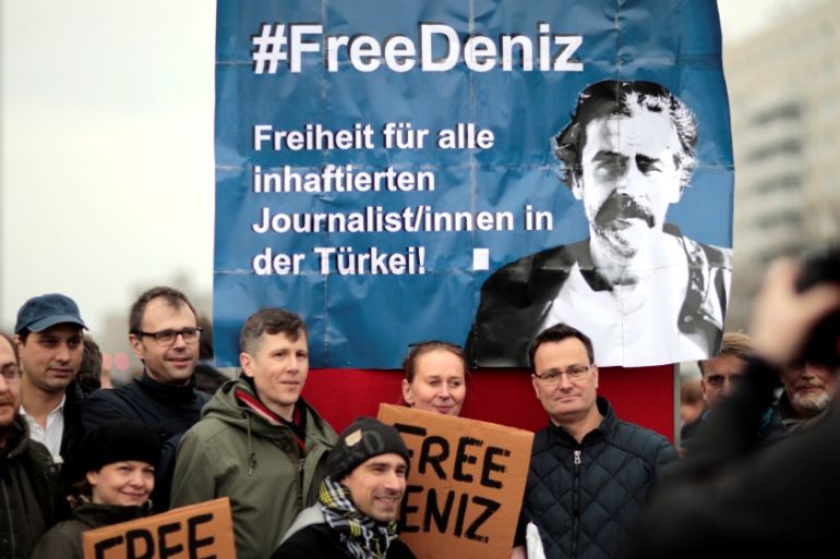 Protestors demonstrate, calling for the freedom of German-Turkish journalist Deniz Yucel, in the streets of Berlin