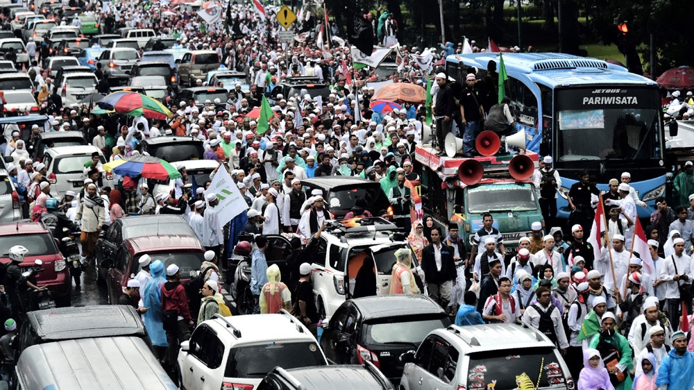 The gathering in Jakarta drew tens of thousands of Muslims [AFP]