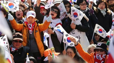 Rival protests took place across Seoul during the past three months over Park's impeachment [Ahn Young-joon/AP]