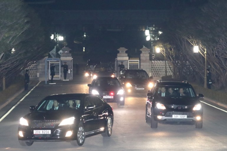 A convoy of vehicles transporting South Korea''s ousted leader Park Geun-hye leaves the Presidential Blue House in Seoul