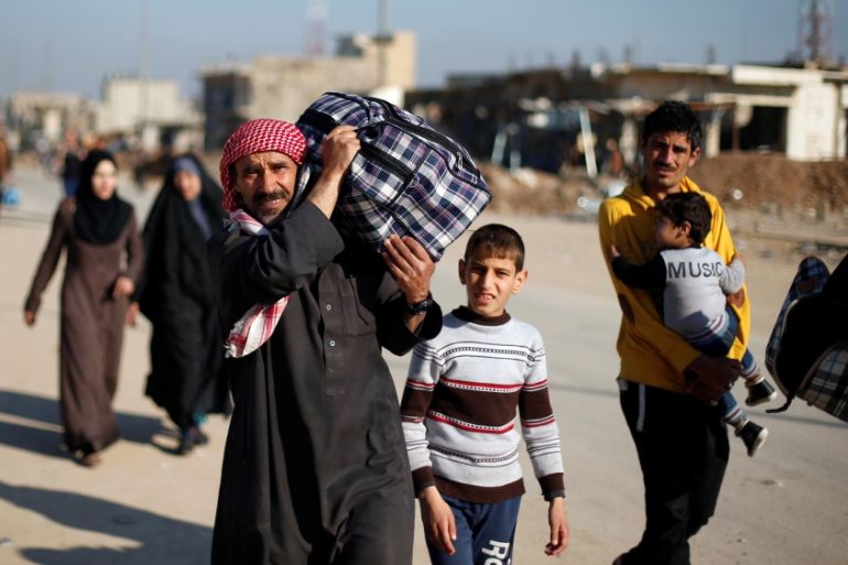 Displaced Iraqis flee ISIL in western Mosul