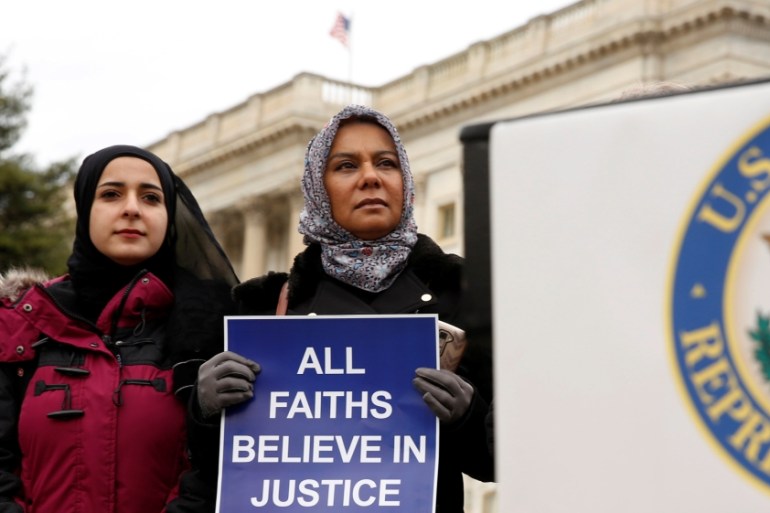 Muslim women listen to remarks during a news conference on Capitol Hill in Washington