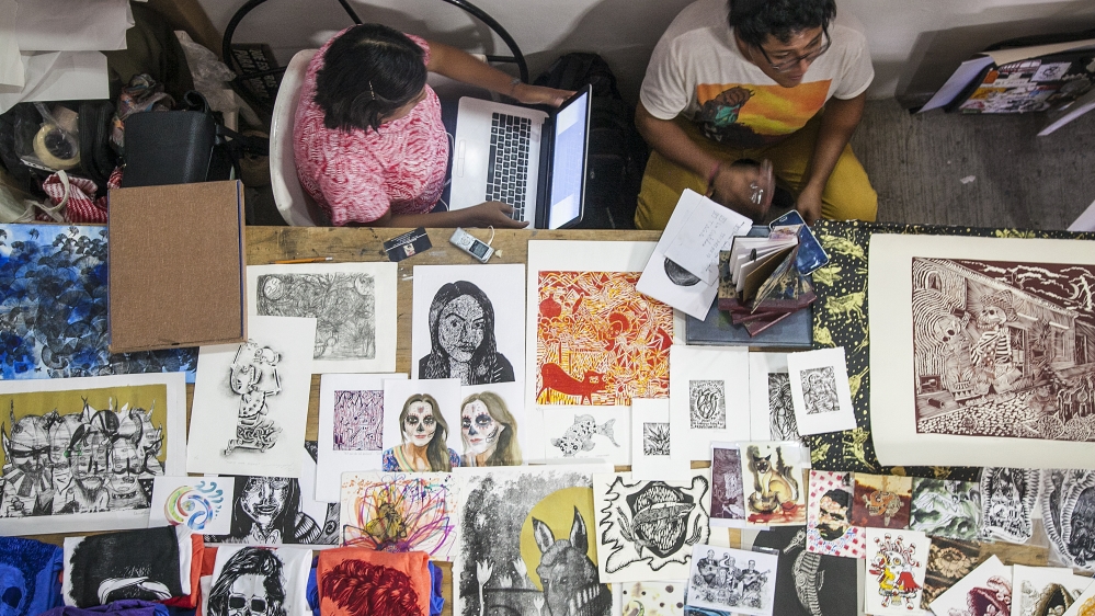 
Oaxacan artists showcase their prints at the 3rd annual Feria Graphica [Gabriela Campos/Al Jazeera] 
