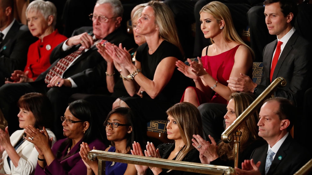 First Lady Melania Trump, and guests, applaud on Capitol Hill in Washington during President Donald Trump's address to a joint session of Congress [AP]