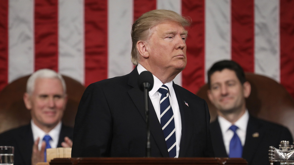 President Donald Trump addresses a joint session of Congress on Capitol Hill in Washington [AP]