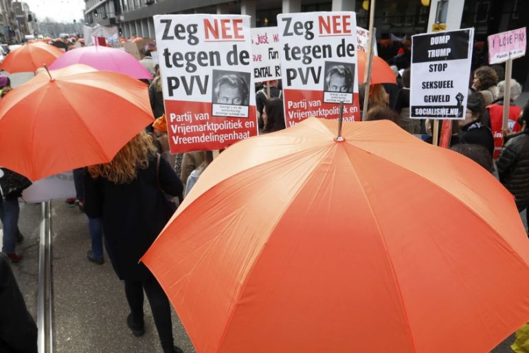 Demonstrators march to insprire public to vote against hate in Amsterdam