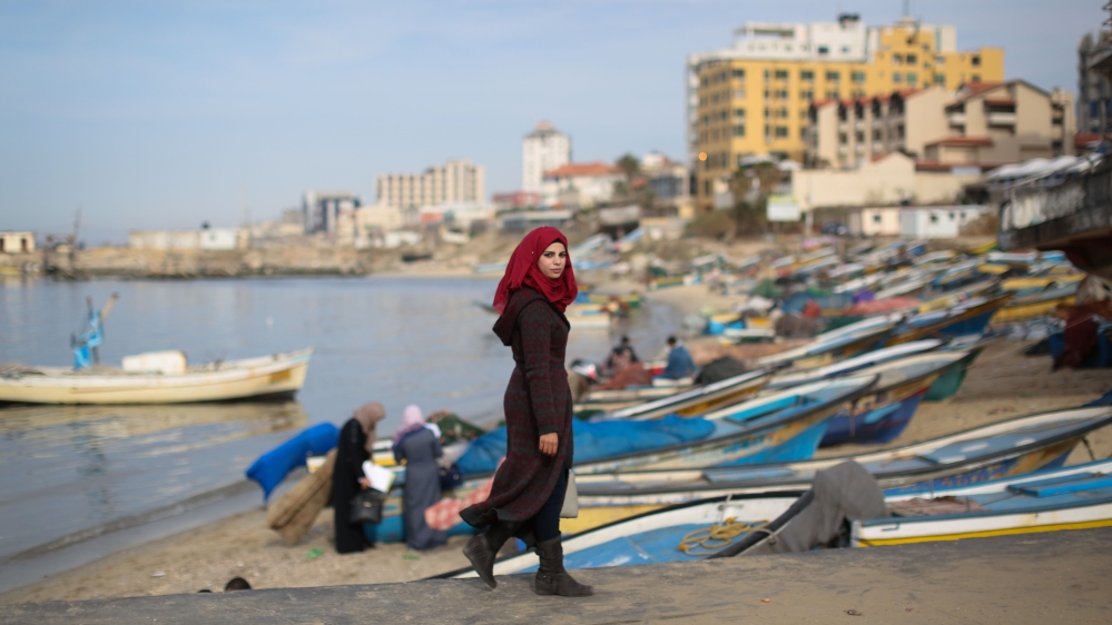 Kullab earns just 500 shekels ($135) a month, although her income may fluctuate based on weather conditions, Israeli naval policies and the availability of fish [Ezz Zanoun/Al Jazeera] 